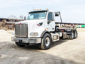 Daily & Weekly Roll-Off Rentals - Custom Truck One Source